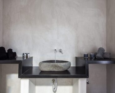 Bathroom with stone basin at Platinum Superior Villa in Kalafatis, Mykonos