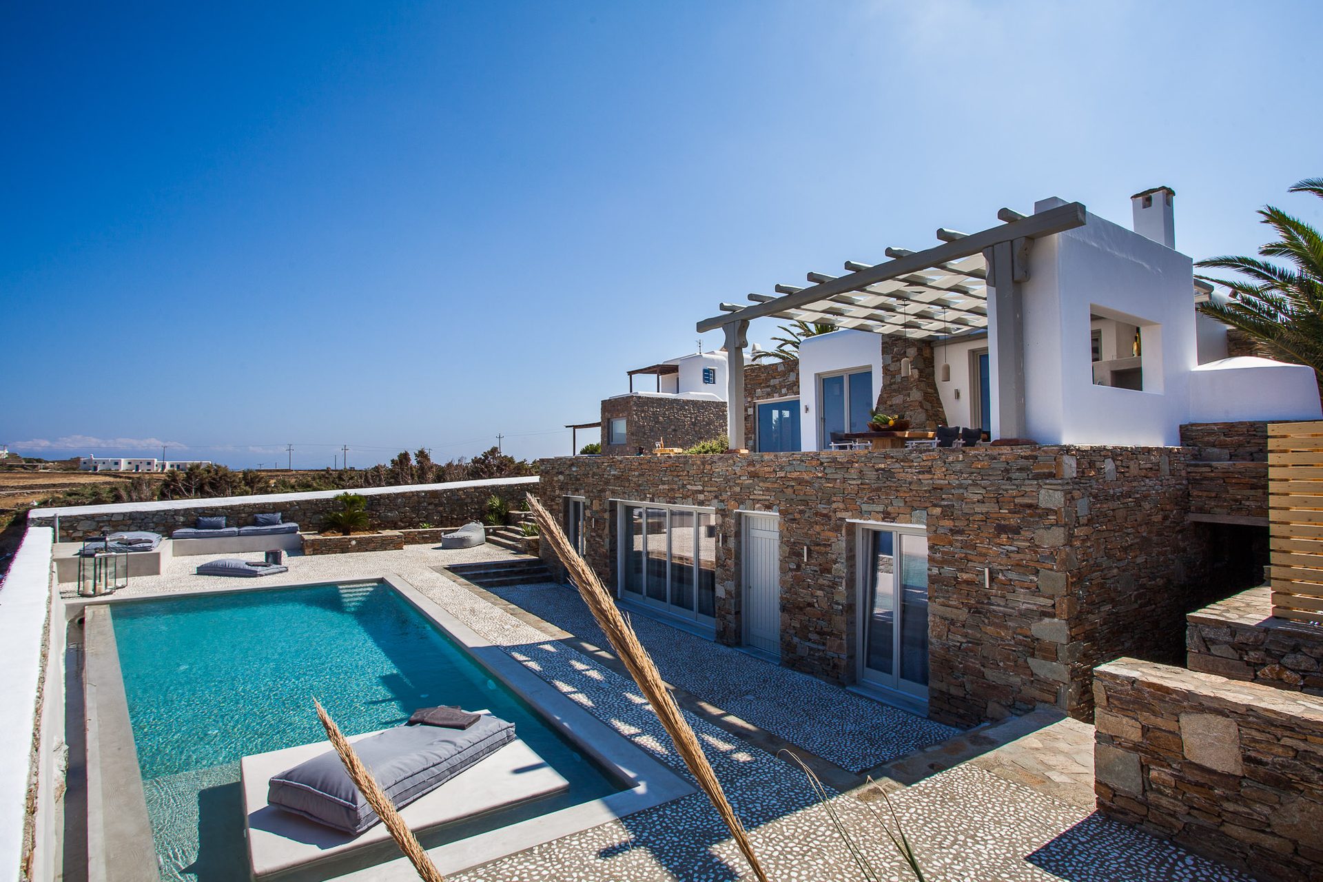 Pool and villa terraces at Platinum Superior Villa in Kalafatis, Mykonos