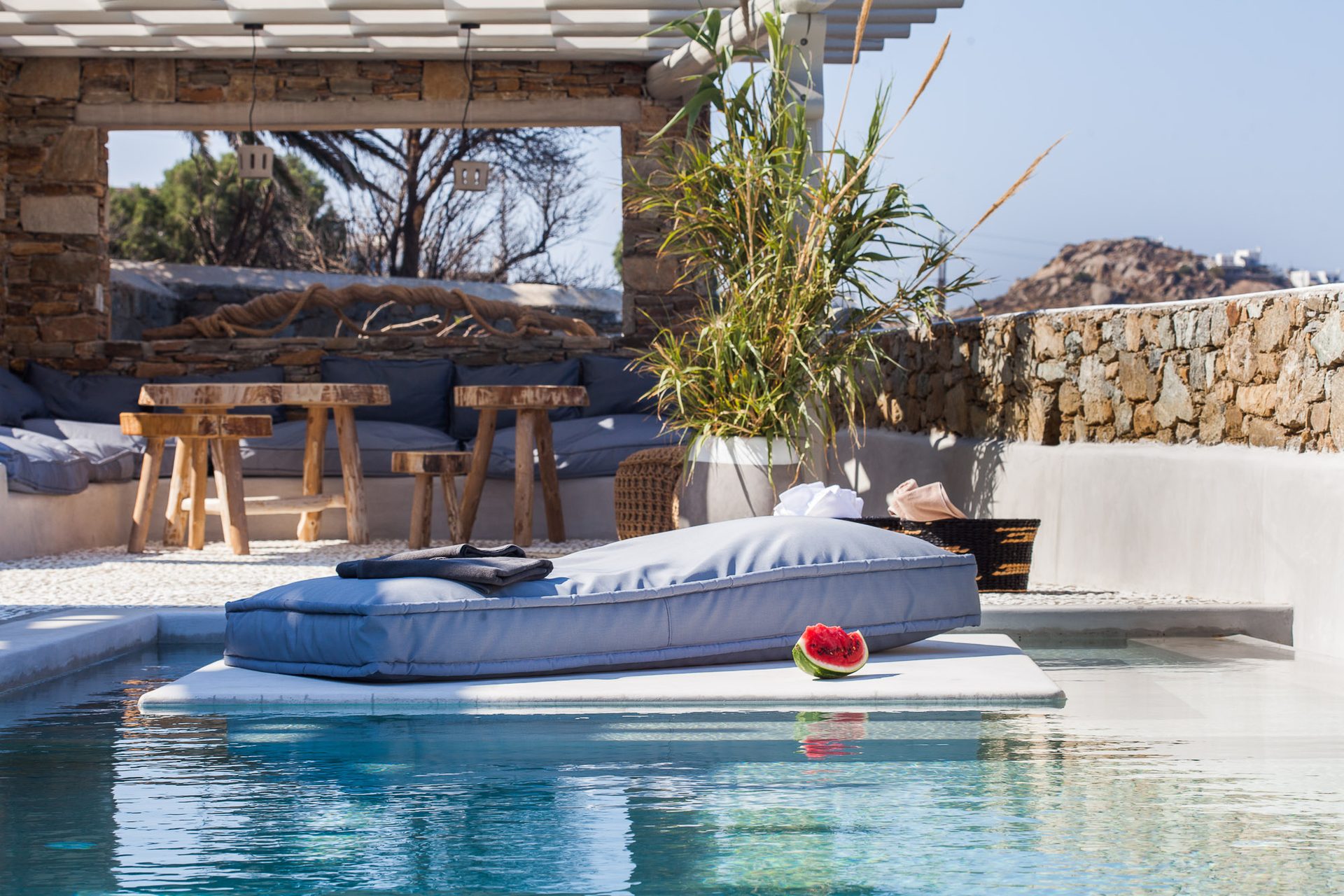 Pool with lounge area at Platinum Superior Villa in Kalafatis, Mykonos