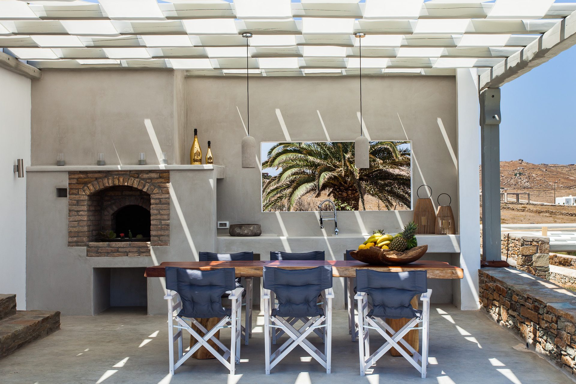 Covered outdoor dining area at Platinum Superior Villa in Kalafatis, Mykonos