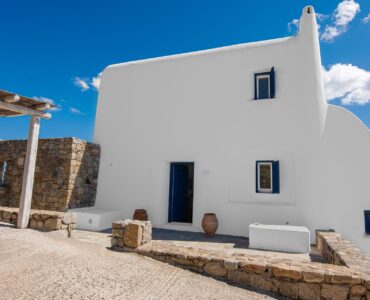 Whitewashed Cycladic exterior at Tranquil Villa 5 in Kalafatis, Mykonos