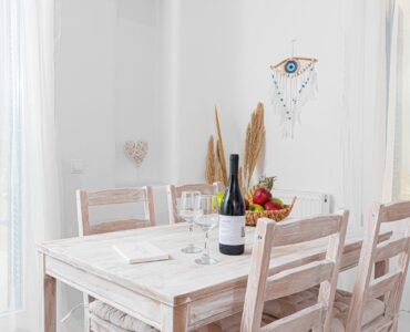 Dining table set for guests at Tranquil Villa 5 in Kalafatis, Mykonos
