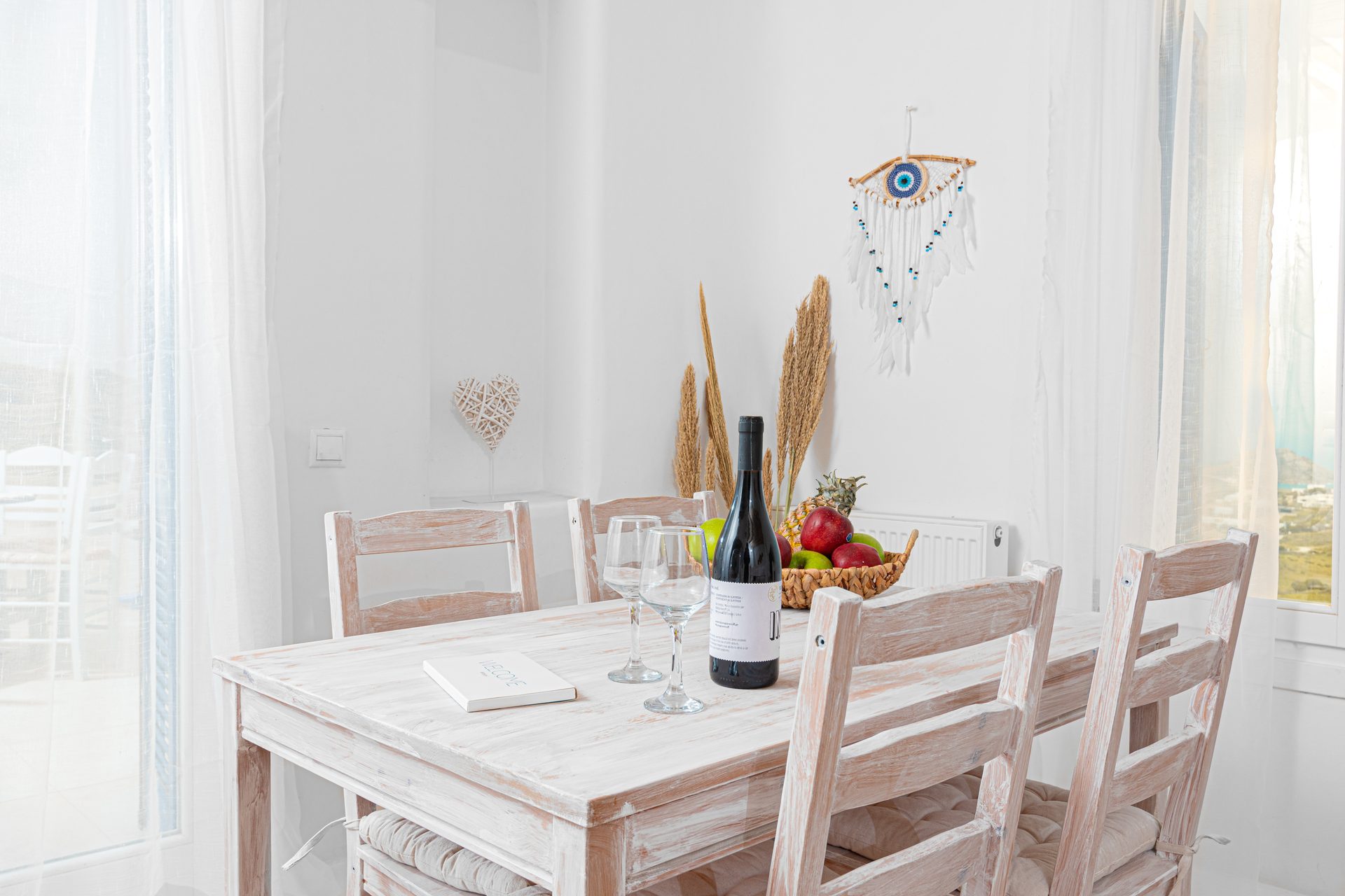 Dining table set for guests at Tranquil Villa 5 in Kalafatis, Mykonos
