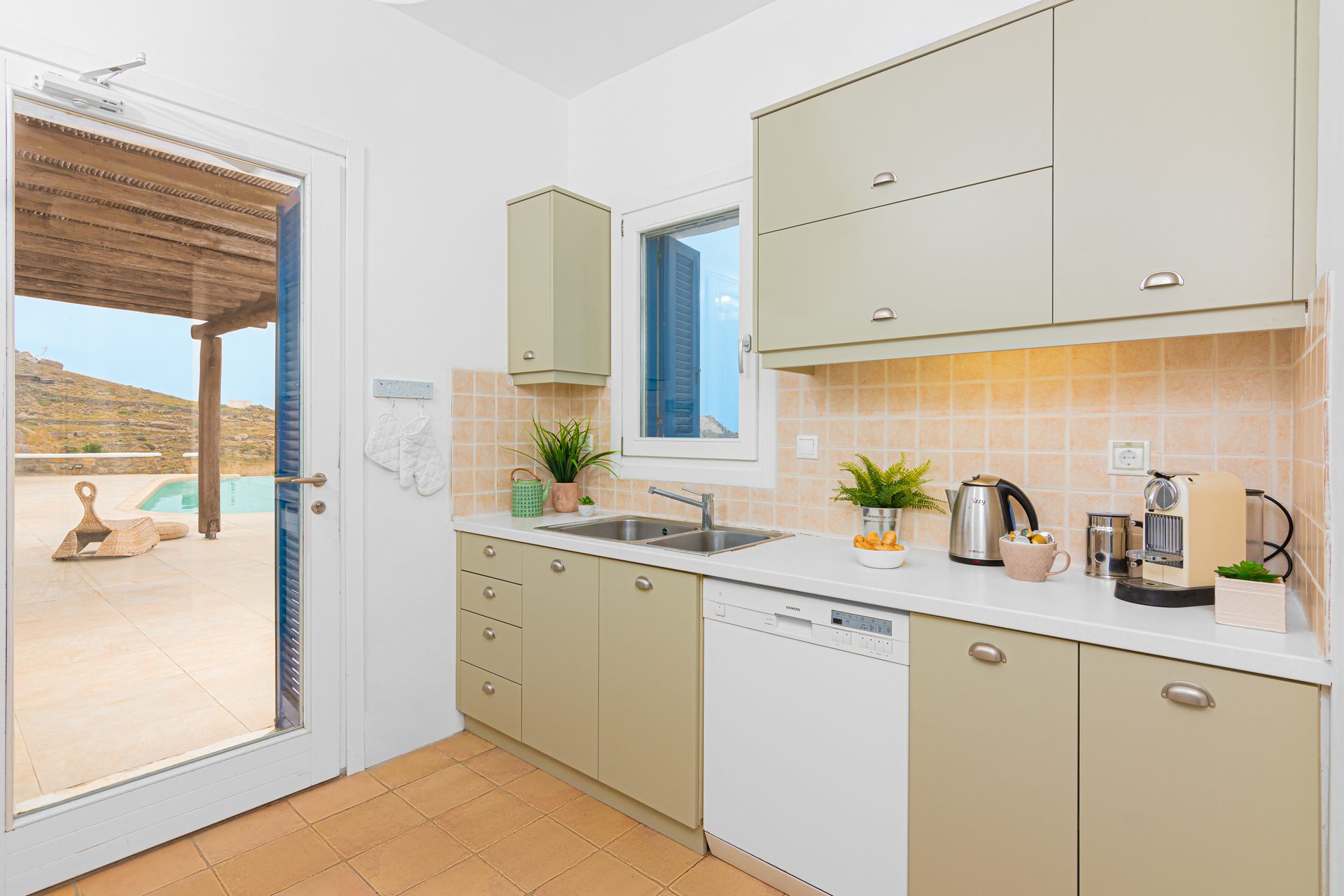 Fully equipped kitchen at Tranquil Villa 5 in Kalafatis, Mykonos
