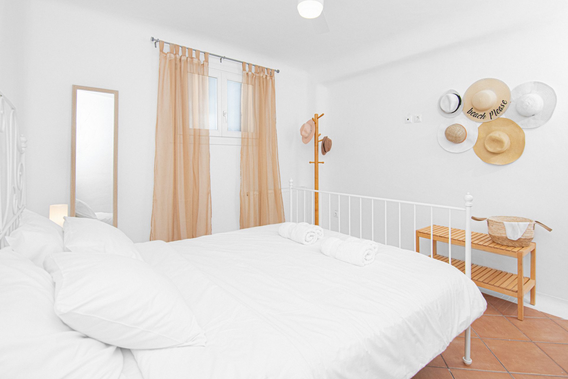 Double bedroom with sitting corner at Tranquil Villa 5 in Kalafatis, Mykonos
