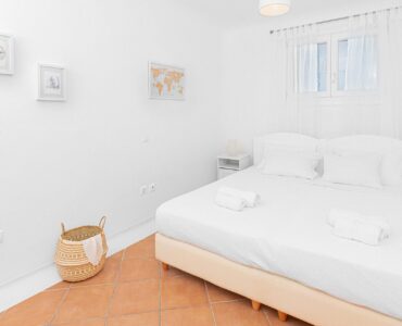 Bedroom with double bed at Tranquil Villa 5 in Kalafatis, Mykonos