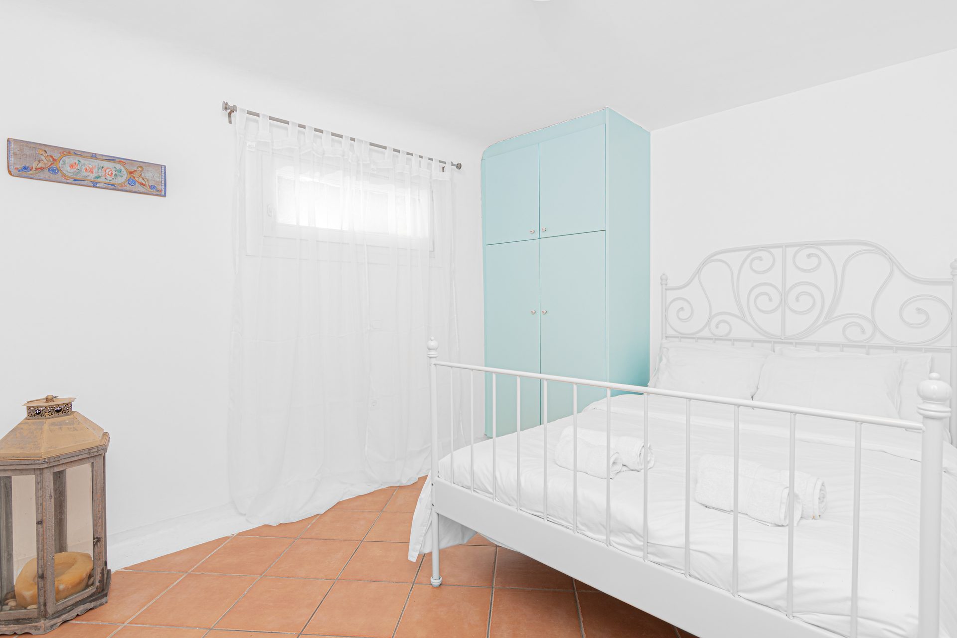 Bedroom with wardrobe at Tranquil Villa 5 in Kalafatis, Mykonos