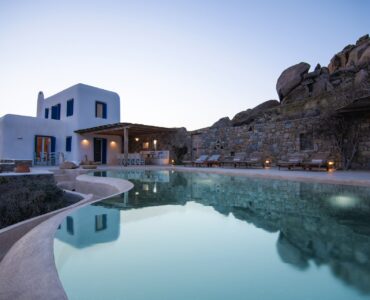 Pool at dusk at Tranquil Villa 5 in Kalafatis, Mykonos