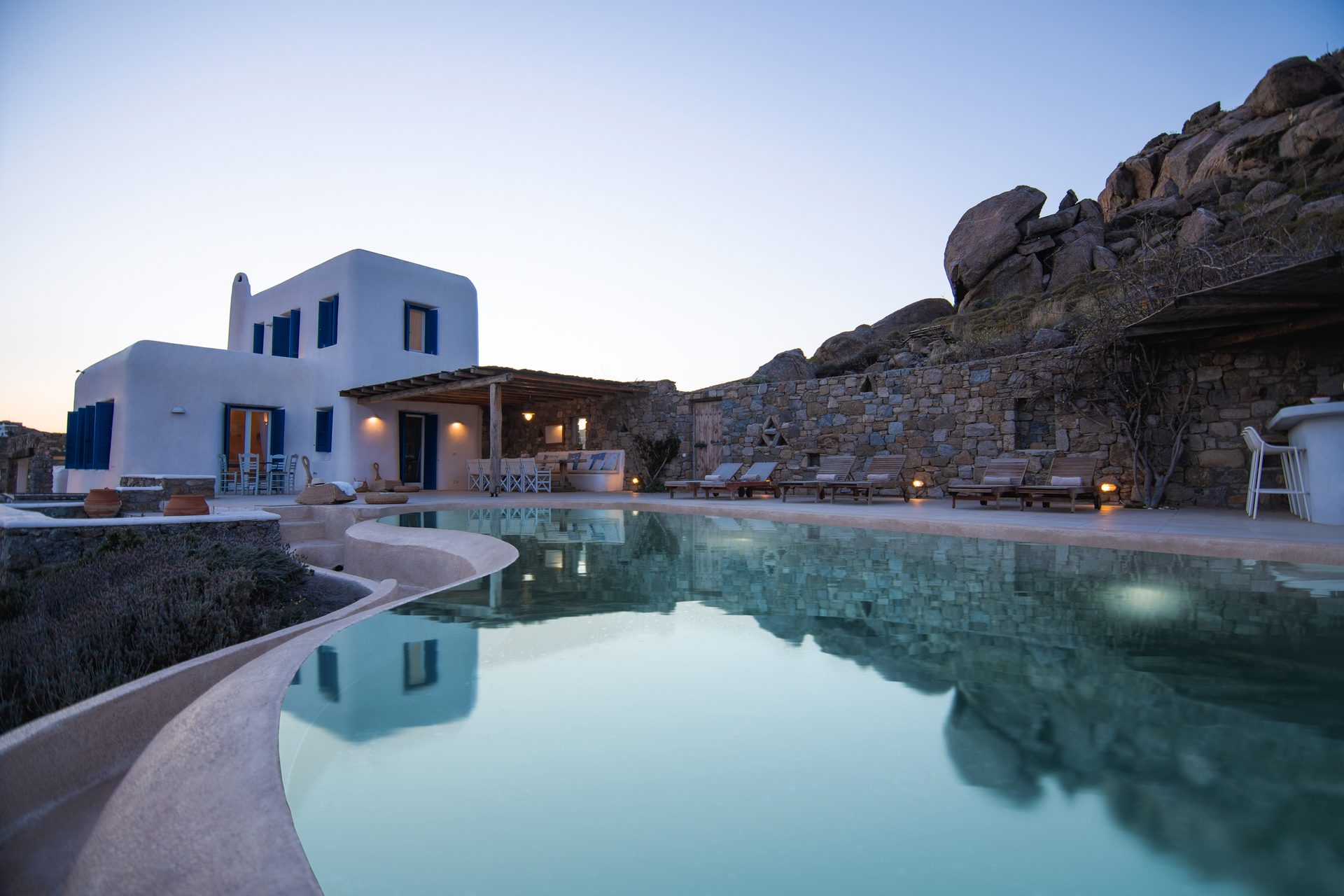 Pool at dusk at Tranquil Villa 5 in Kalafatis, Mykonos