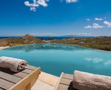 Pool with sun loungers and sea view at Tranquil Villa 5 in Kalafatis, Mykonos