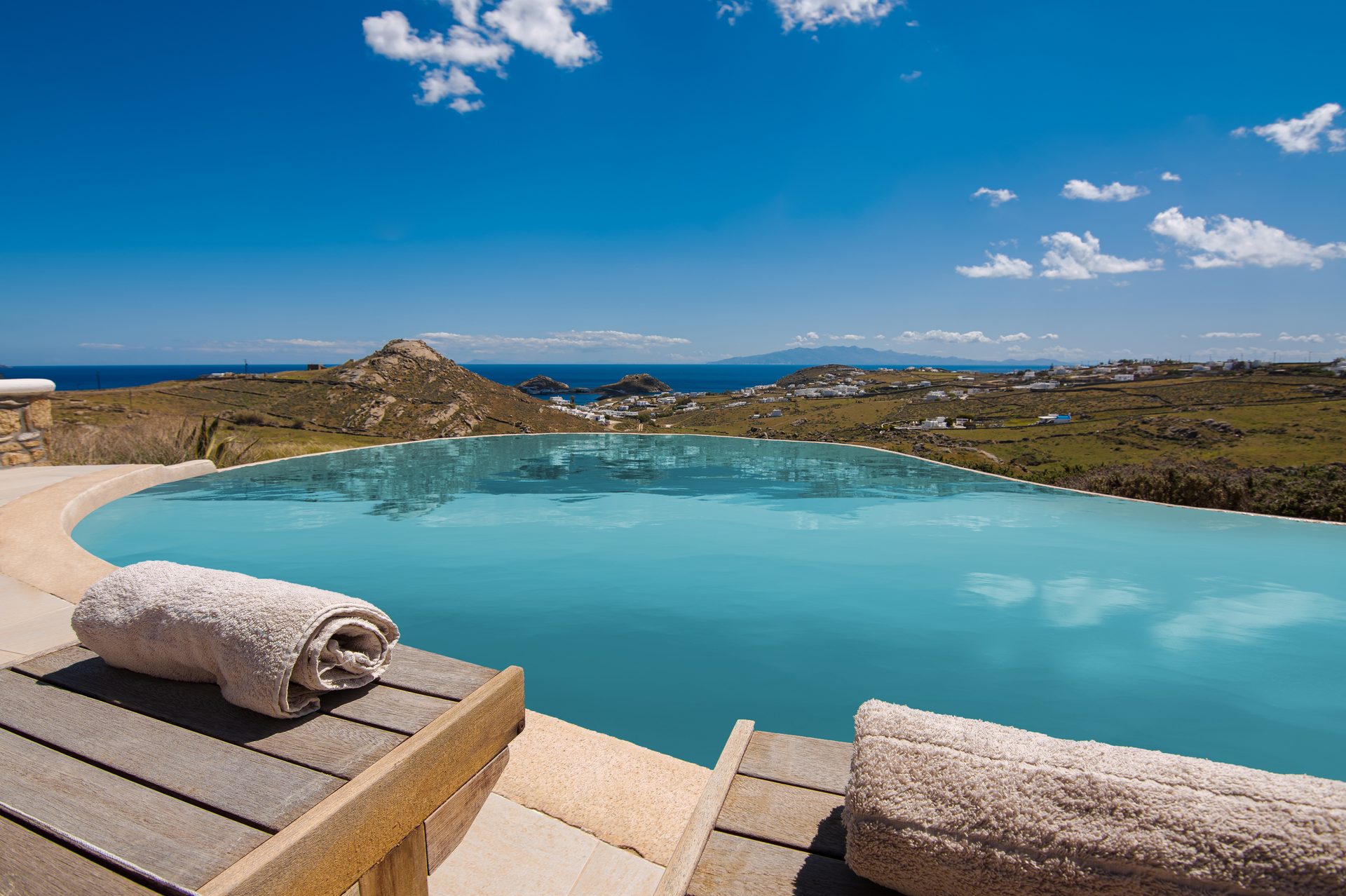 Pool with sun loungers and sea view at Tranquil Villa 5 in Kalafatis, Mykonos
