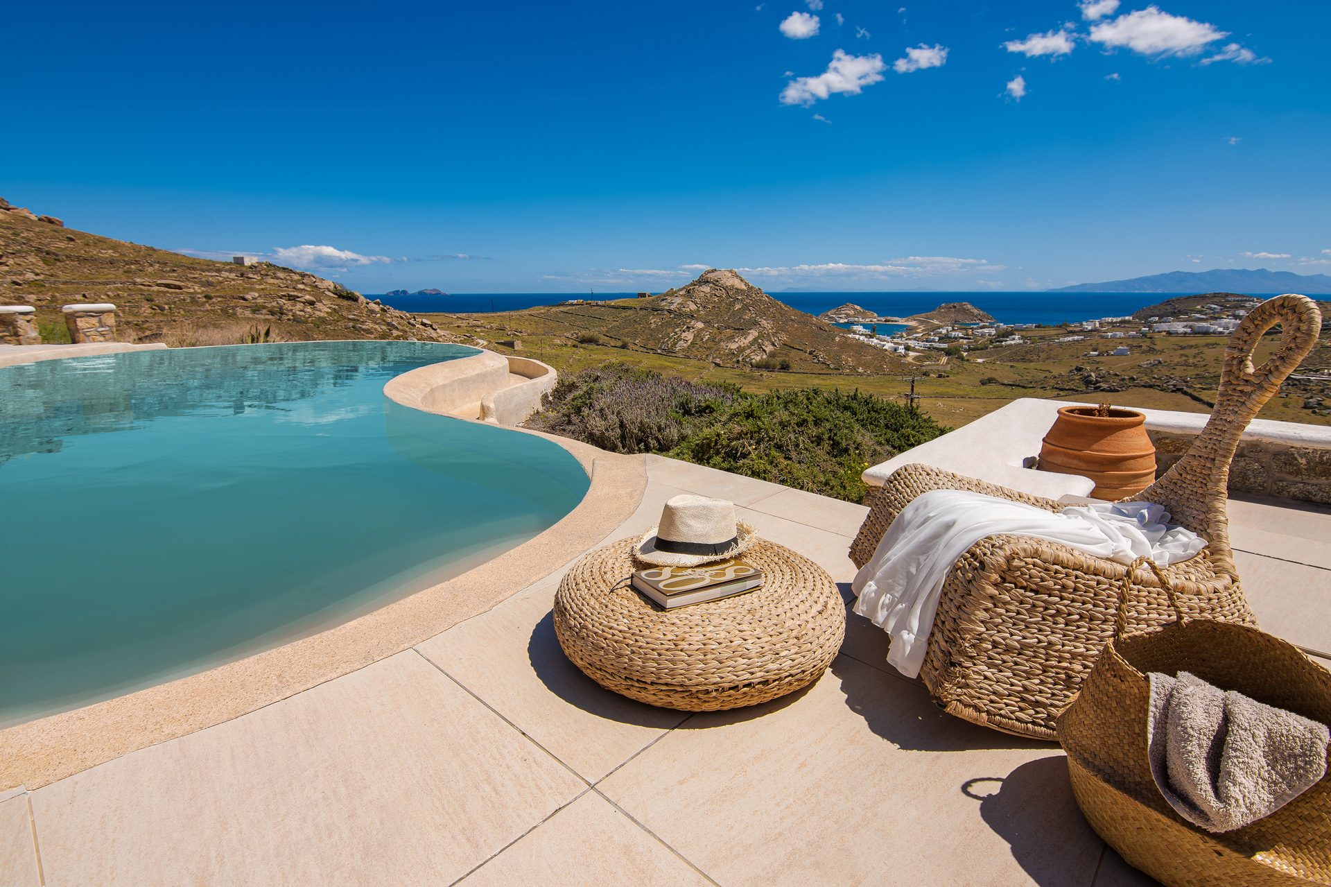 Pool terrace with daybed at Tranquil Villa 5 in Kalafatis, Mykonos