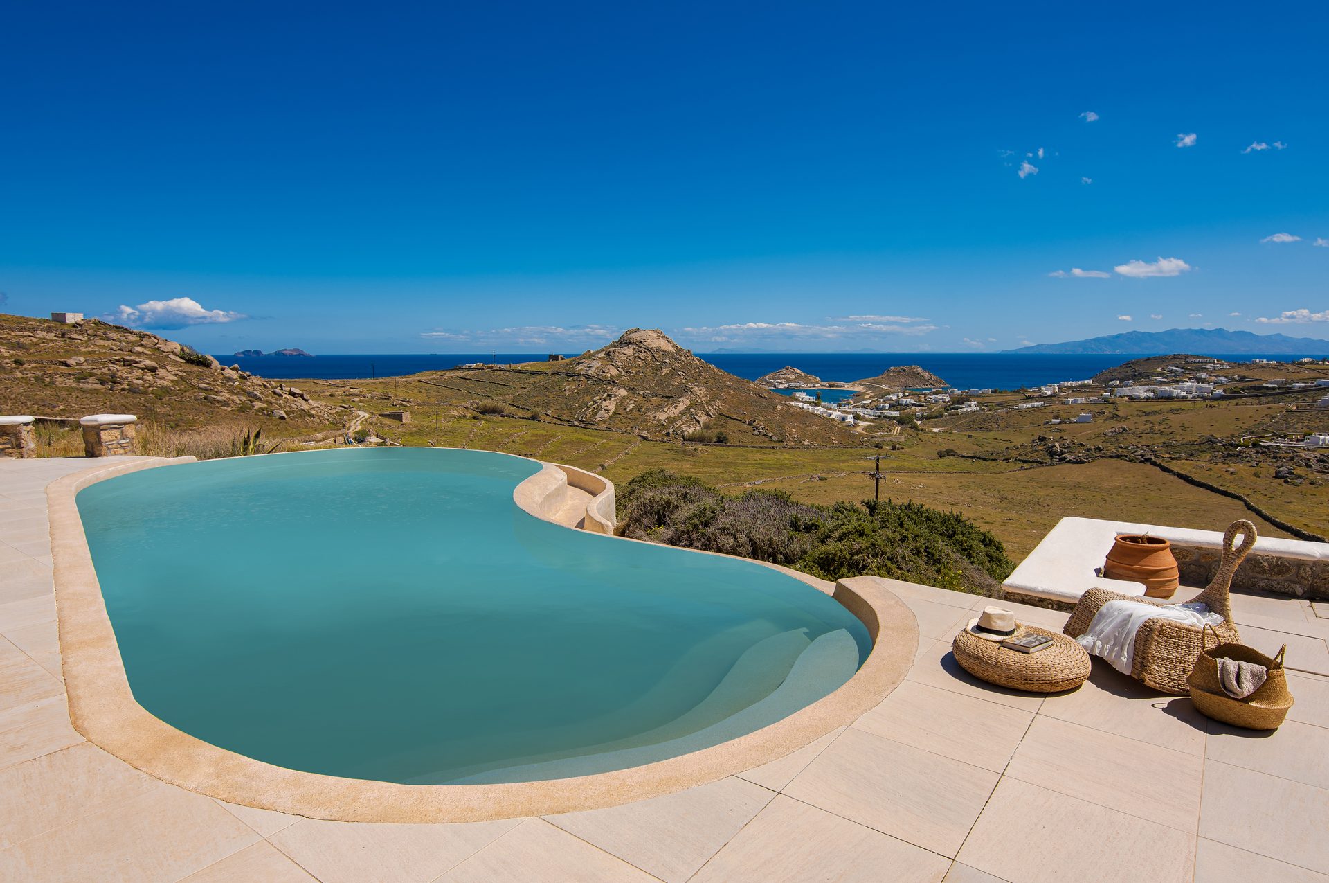 Pool and countryside view at Tranquil Villa 5 in Kalafatis, Mykonos