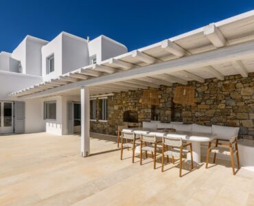 Covered outdoor dining terrace at Villa Alkioni in Agios Lazaros, Mykonos