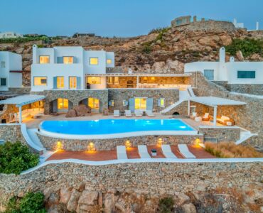 Villa and pool at dusk at Villa Alkioni in Agios Lazaros, Mykonos