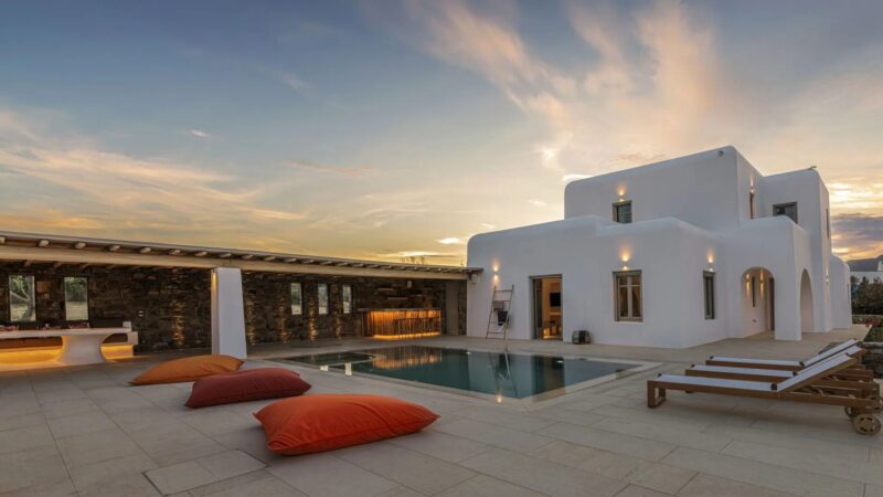 Private pool terrace at sunset at Villa Aloni in Ftelia, Mykonos