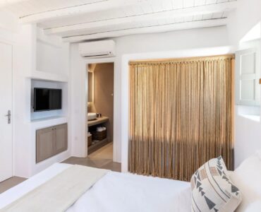 Bedroom with smart TV at Villa Aloni in Ftelia, Mykonos