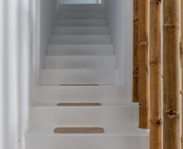 Whitewashed staircase at Villa Aloni in Ftelia, Mykonos