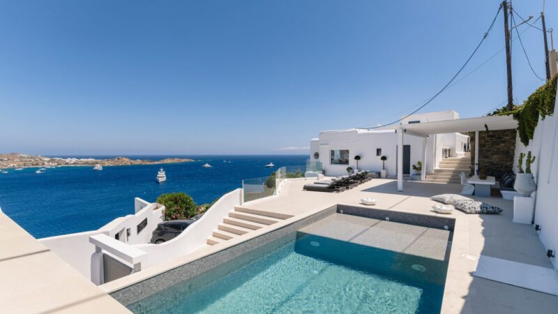 Pool with views over the bay at Villa Aquablue in Agios Lazaros, Mykonos