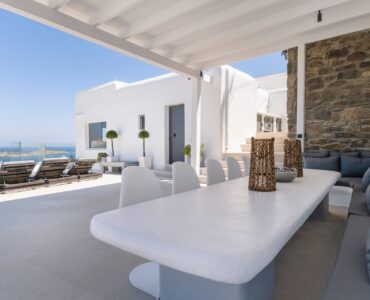 Covered outdoor dining area at Villa Aquablue in Agios Lazaros, Mykonos