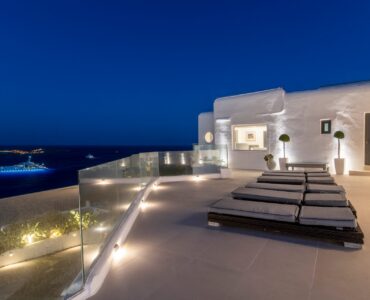 Terrace at dusk at Villa Aquablue in Agios Lazaros, Mykonos