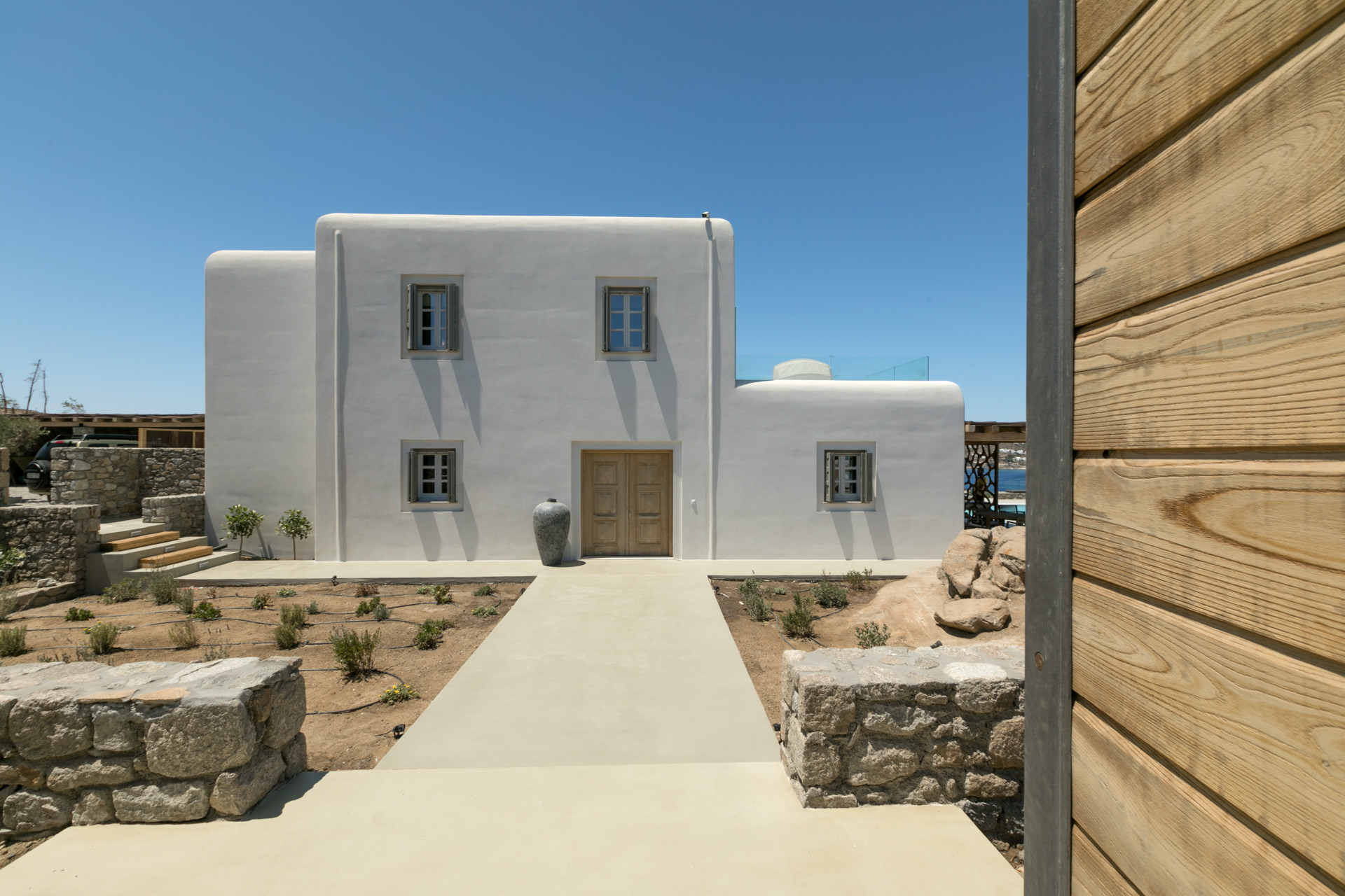 Main house entrance path at Villa Arion in Aleomandra, Mykonos