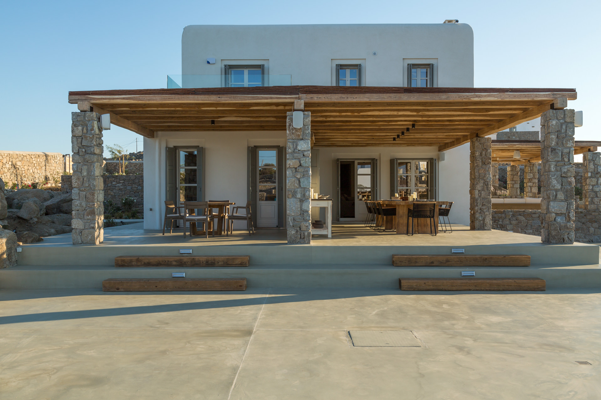 Covered terrace of the main house at Villa Arion in Aleomandra, Mykonos