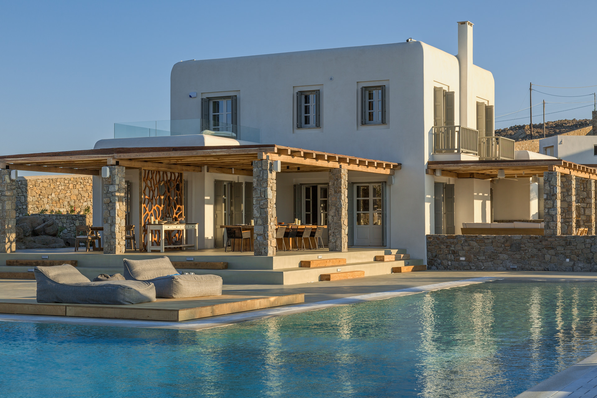 Main house and beach-entry pool at Villa Arion in Aleomandra, Mykonos