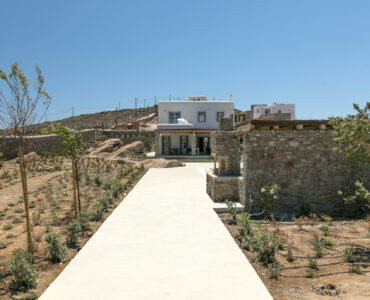 Path through the garden to the villa at Villa Arion in Aleomandra, Mykonos