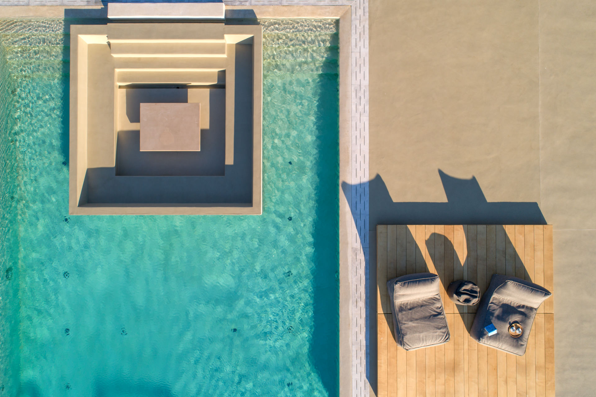 Pool sunken lounge from above at Villa Arion in Aleomandra, Mykonos