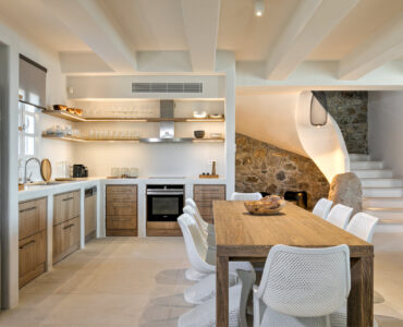 Kitchen and dining table at Villa Arion in Aleomandra, Mykonos