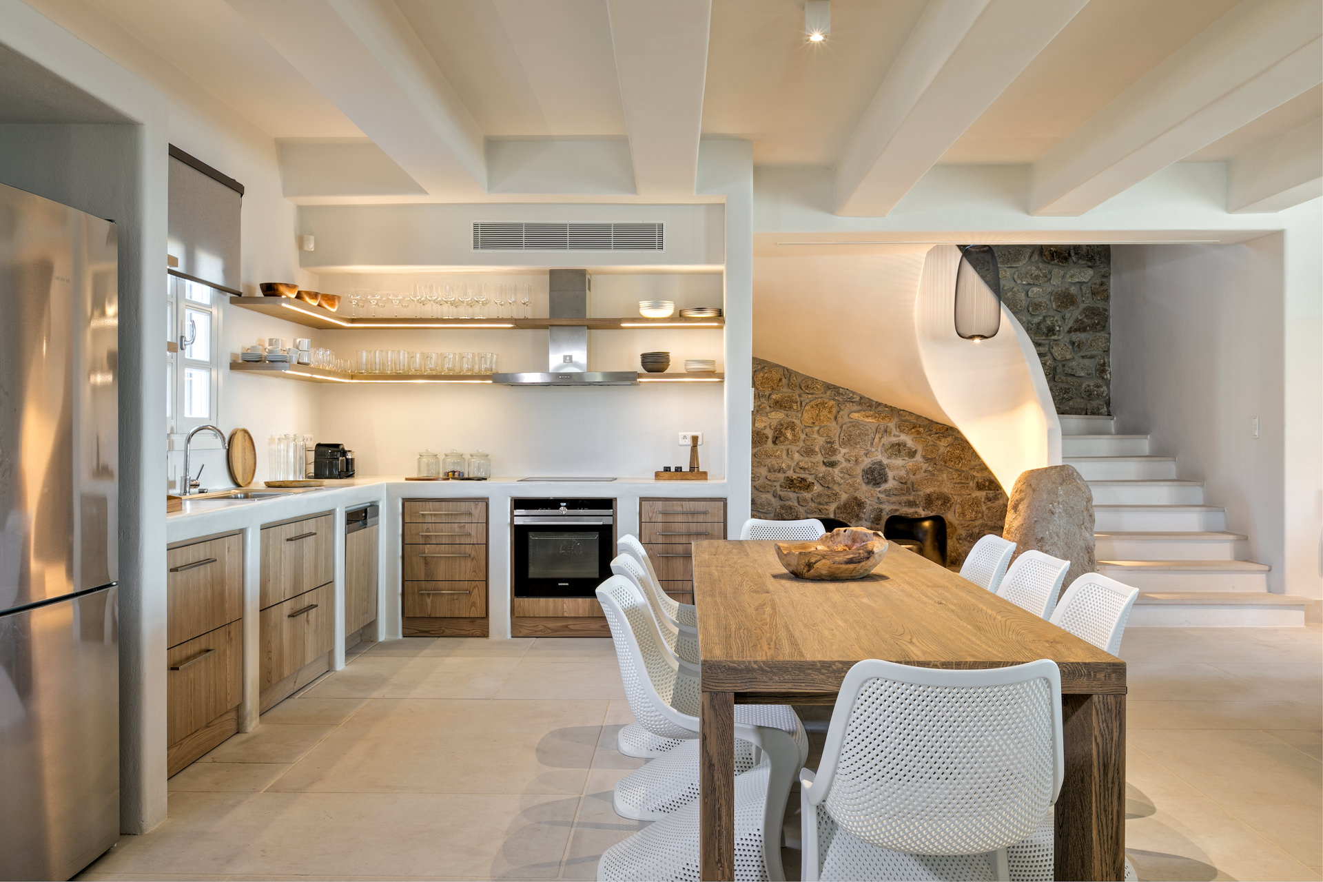 Kitchen and dining table at Villa Arion in Aleomandra, Mykonos