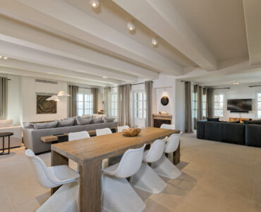 Dining area and living room at Villa Arion in Aleomandra, Mykonos