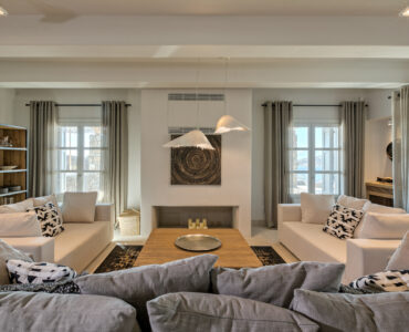 Living room with sofas at Villa Arion in Aleomandra, Mykonos