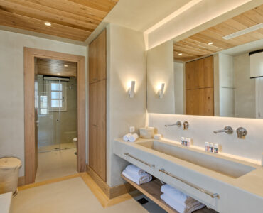 Master bathroom with double vanity at Villa Arion in Aleomandra, Mykonos