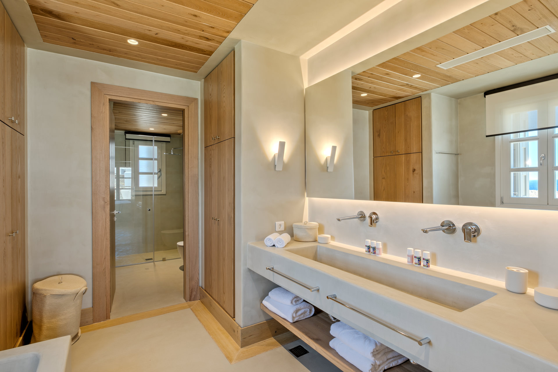 Master bathroom with double vanity at Villa Arion in Aleomandra, Mykonos