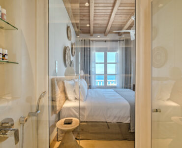 En suite shower and bedroom view at Villa Arion in Aleomandra, Mykonos