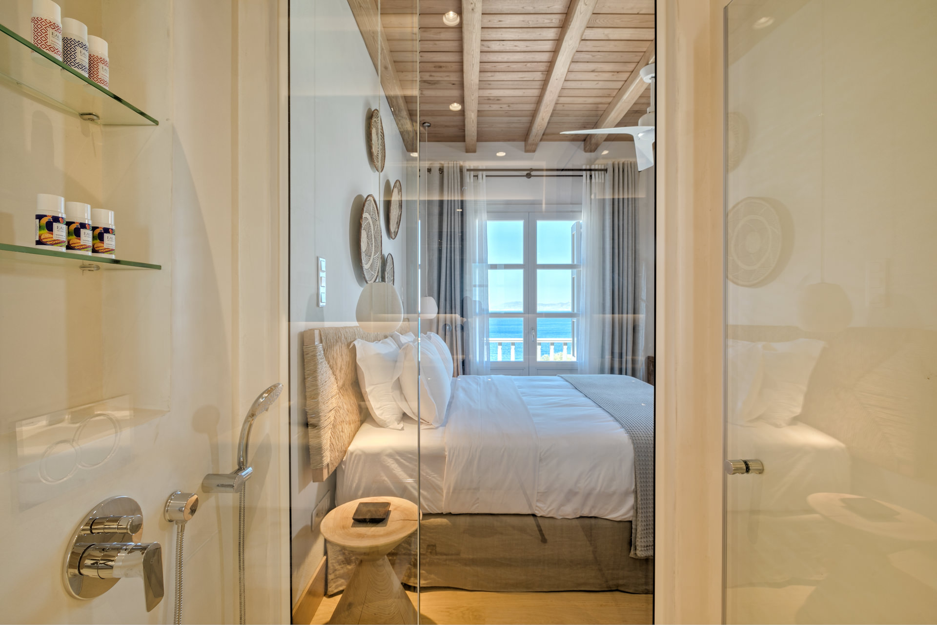 En suite shower and bedroom view at Villa Arion in Aleomandra, Mykonos