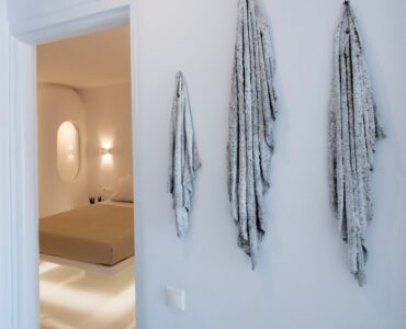 Hallway with artwork at Villa Costa in Elia, Mykonos