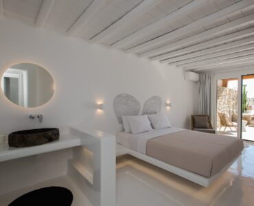Bedroom with terrace door at Villa Costa in Elia, Mykonos