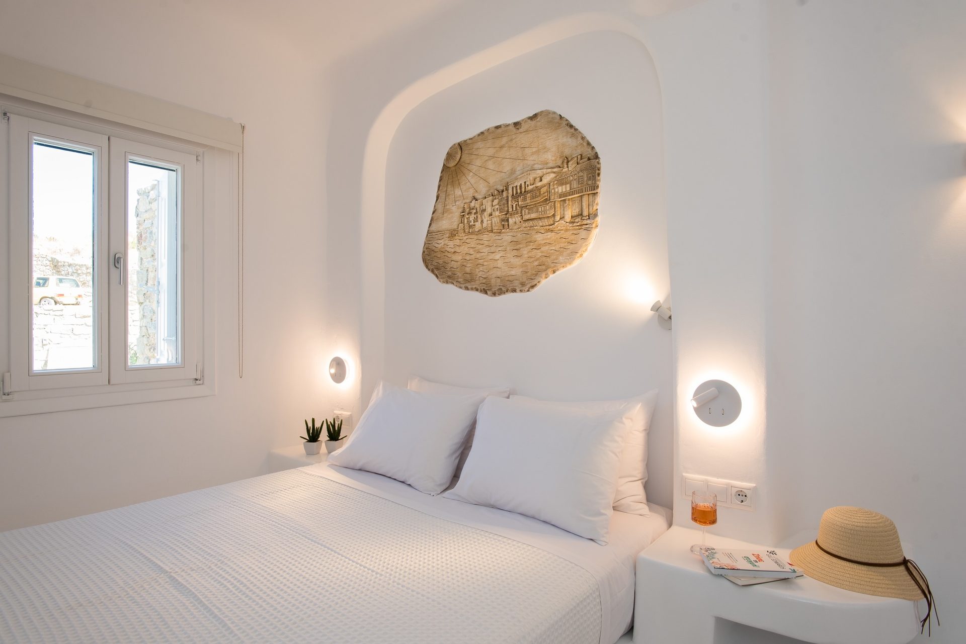 Bedroom with stone detail at Villa Costa in Elia, Mykonos