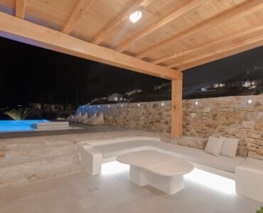 Covered terrace at night at Villa Costa in Elia, Mykonos