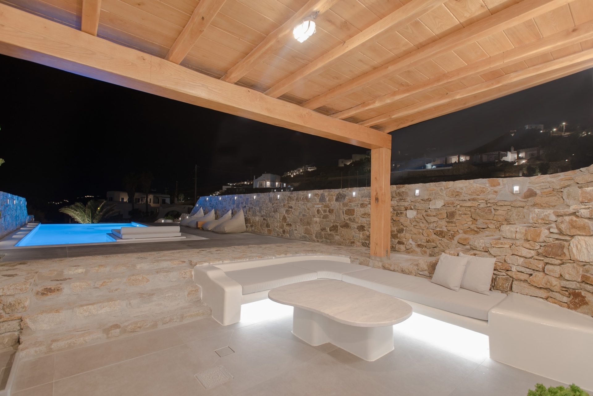 Covered terrace at night at Villa Costa in Elia, Mykonos