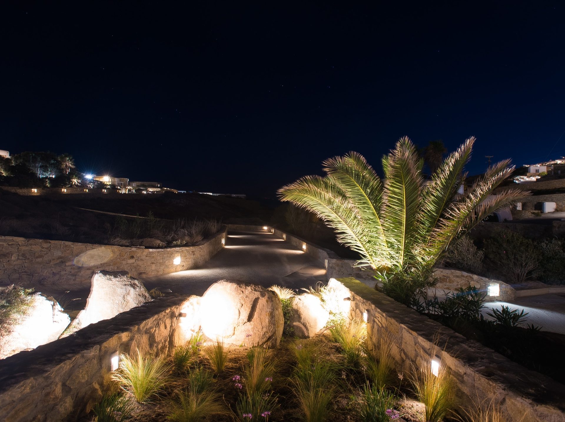 Garden lights at night at Villa Costa in Elia, Mykonos
