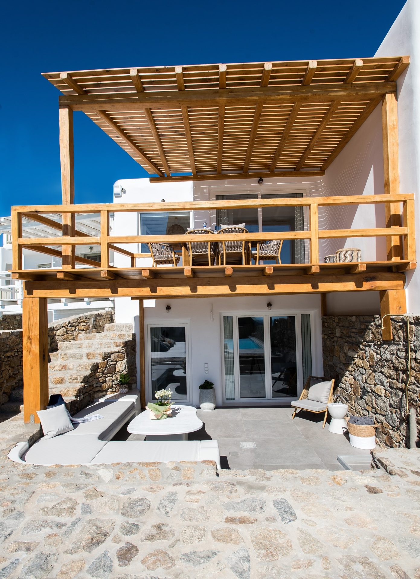 Covered veranda by the pool at Villa Costa in Elia, Mykonos