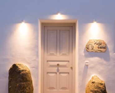 Entrance door with stone details at Villa Costa in Elia, Mykonos