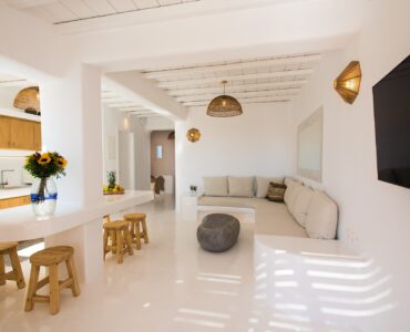 Open-plan living and dining area at Villa Costa in Elia, Mykonos