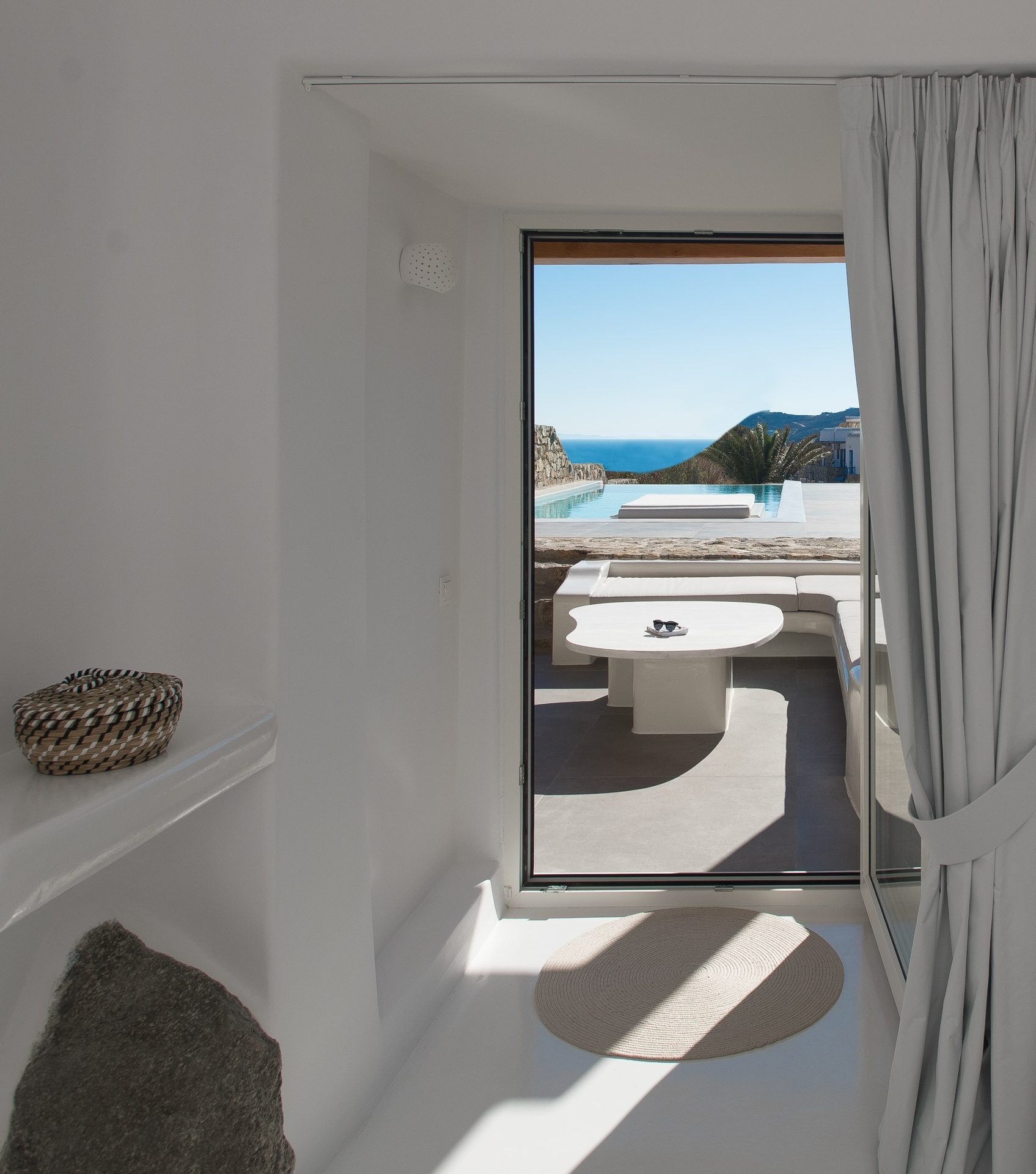 Doorway with sea view at Villa Costa in Elia, Mykonos