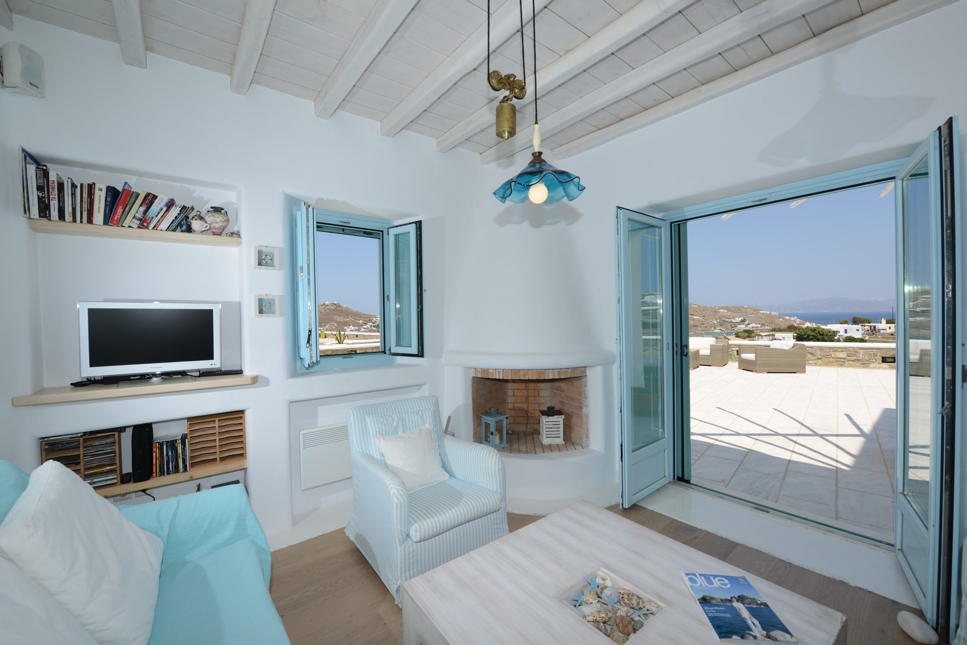 Living room with terrace door at Villa Danelina in Agios Lazaros, Mykonos