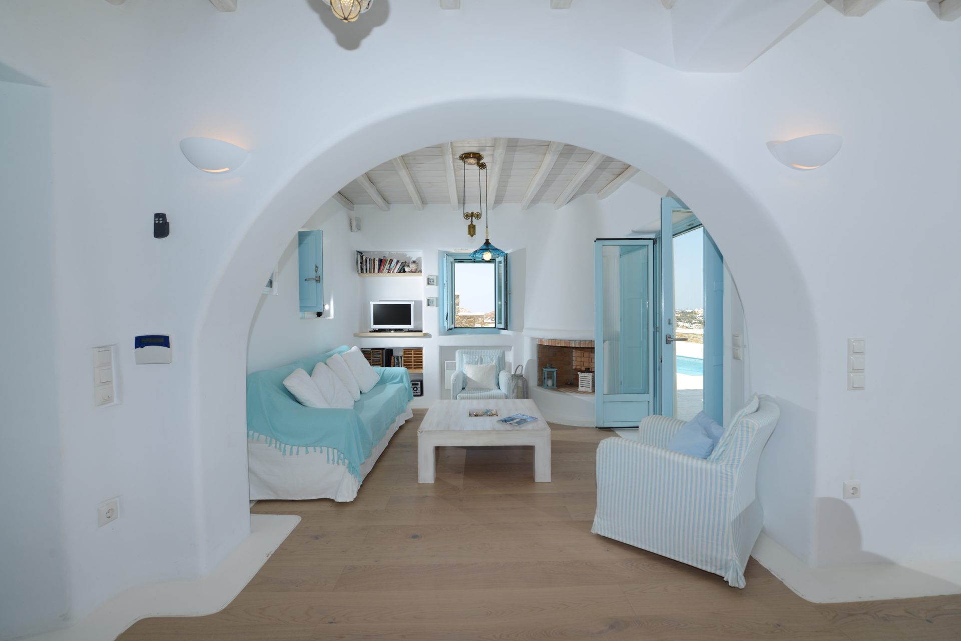 Arched passage to the living room at Villa Danelina in Agios Lazaros, Mykonos